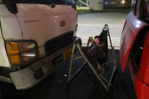 Tài xế trắng đêm mắc võng, ngủ trên xe đợi đăng kiểm