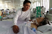 “Em tỉnh dậy về với bố con anh đi em !”