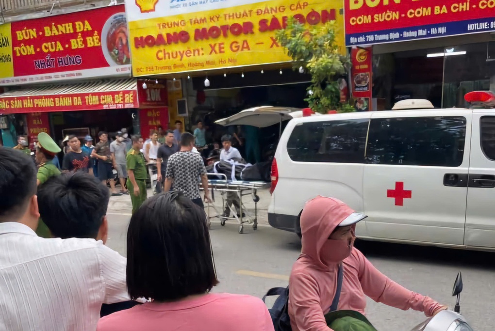 Án mạng tại cửa hàng sửa xe máy ở Hà Nội - 1 Án mạng tại cửa hàng sửa xe máy ở Hà Nội - 1