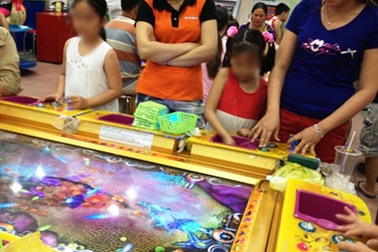 Trẻ mầm non “đốt” tiền triệu vào trò bắn cá