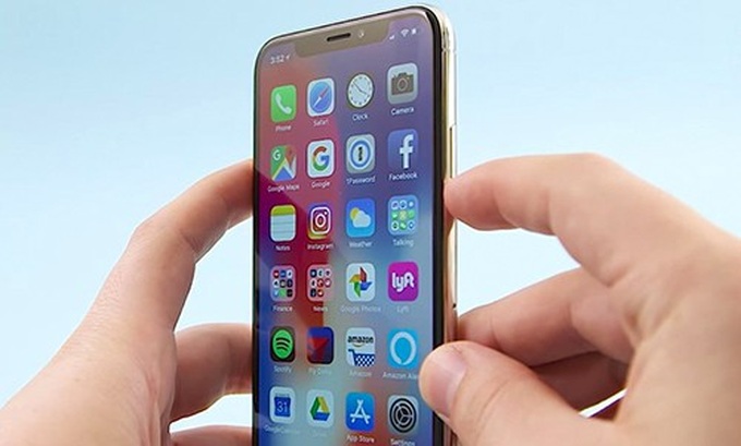 Nút nguồn iPhone X phản ánh sự phát triển của smartphone - Ảnh 1. Nút nguồn iPhone X phản ánh sự phát triển của smartphone - Ảnh 1.
