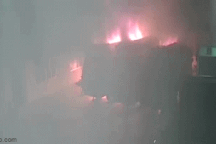 Điều tra vụ cháy xe thu rác tiền tỷ lúc trời đang mưa