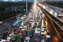 Hàng vạn người đội mưa về quê ăn Tết trong ngày làm việc cuối cùng của năm