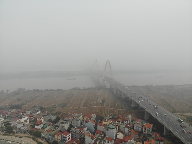 Không khí Hà Nội liên tục ở ngưỡng xấu, nhà cao tầng chìm trong mù mịt - 10 Không khí Hà Nội liên tục ở ngưỡng xấu, nhà cao tầng chìm trong mù mịt - 10