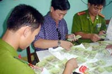 Phá vụ vận chuyển lưu hành tiền giả lớn