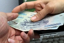 Bắt quả tang thiếu úy công an nhận hối lộ tiền