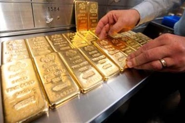 Giá vàng chạm mốc 1400 USD/ounce vì "điểm nóng" Crimea và FED?