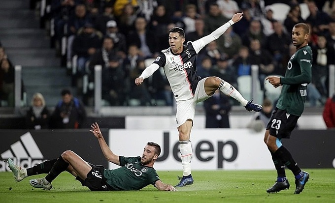 Ronaldo lập công giúp Juventus thắng Bologna - Ảnh 1.