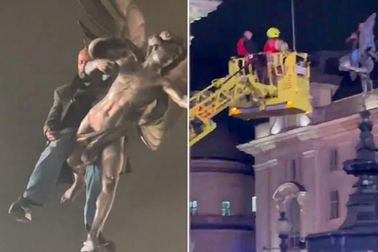 Cưỡi tượng thần tình yêu cao 11m giữa giao lộ và... lướt điện thoại