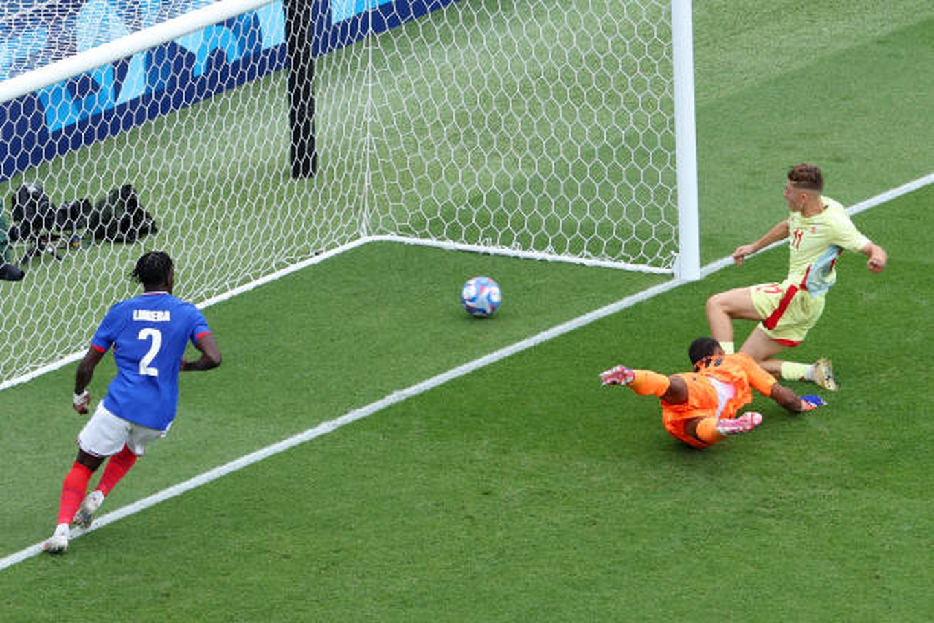 spains-midfielder-fermin-lopez-scores-his-teams-second-goal-in-the-mens-gold-medal-final.jpg