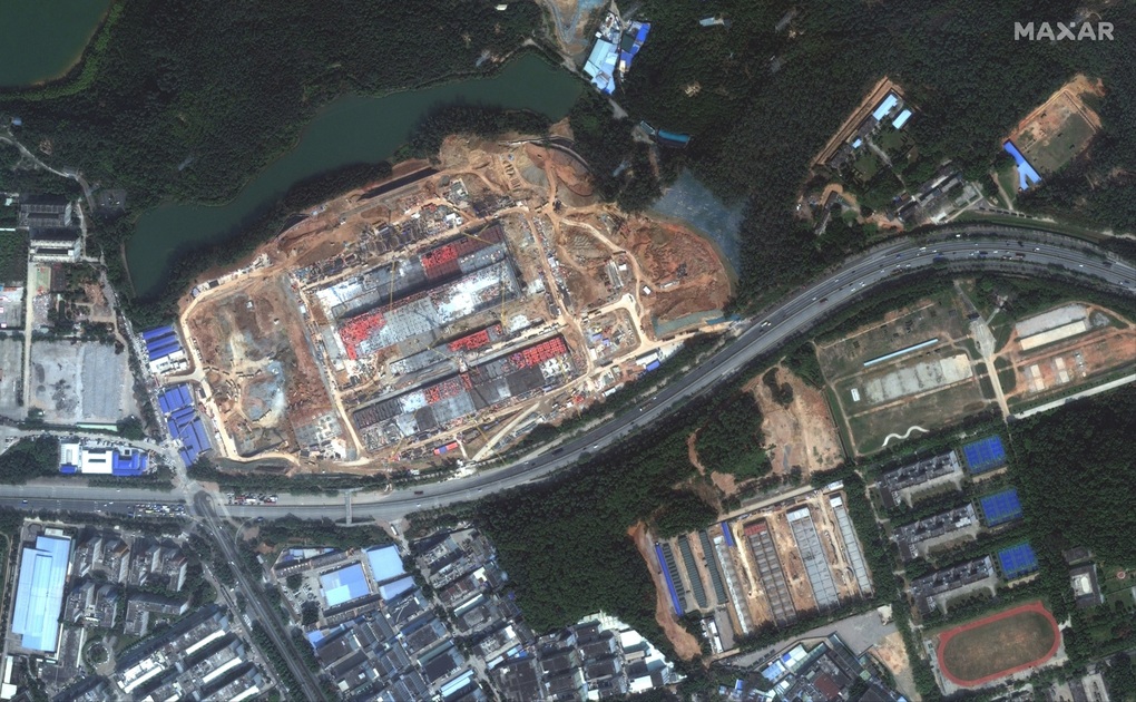 Ảnh chụp vệ tinh vào tháng 3/2022 cho thấy nhà máy của PXW đang được xây dựng. Vị trí của nhà máy gần với trụ sở chính của Huawei (Ảnh: Maxar Technologies). Ảnh chụp vệ tinh vào tháng 3/2022 cho thấy nhà máy của PXW đang được xây dựng. Vị trí của nhà máy gần với trụ sở chính của Huawei (Ảnh: Maxar Technologies).