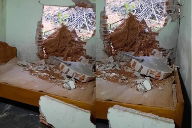 Người đàn ông đang nằm ngủ bị tường sập đè chấn thương chân