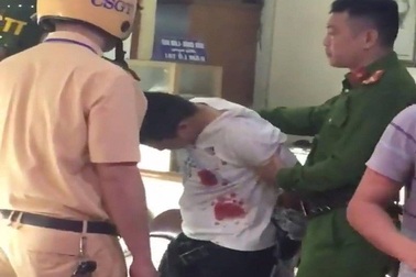 Hà Nội: Bắt nghi phạm dùng súng cướp tiệm vàng trên phố