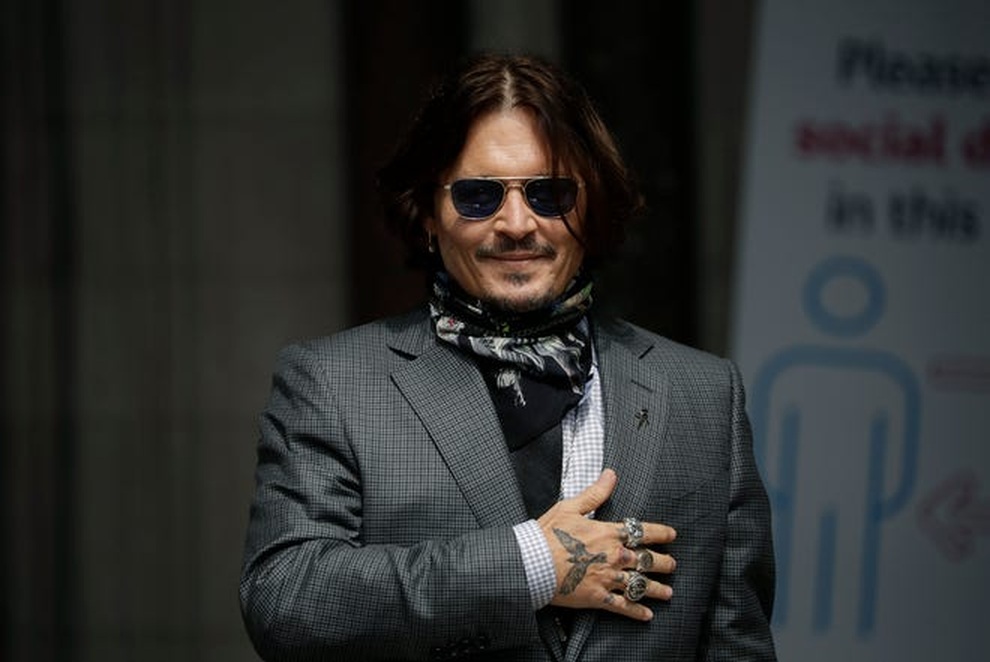 Johnny Depp kiên quyết kiện vợ cũ đến cùng vì cáo buộc bạo hành - 3 Johnny Depp kiên quyết kiện vợ cũ đến cùng vì cáo buộc bạo hành - 3