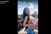 Dư luận "dậy sóng" chỉ trích cô gái bán khỏa thân uốn éo ở phố cổ Hội An