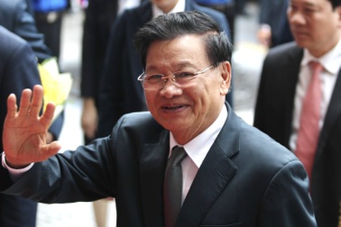 Tổng Bí thư, Chủ tịch nước Lào và Phu nhân đến TPHCM