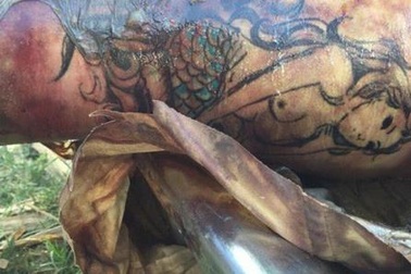 Truy tìm danh tính thi thể trôi sông có hình xăm nàng tiên cá