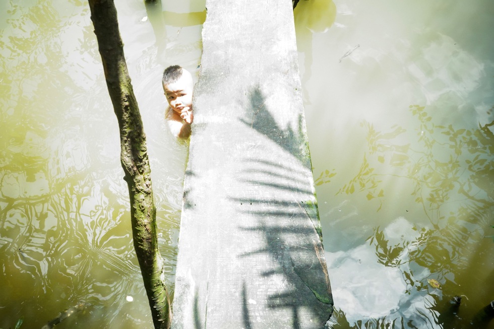 Người Sài Gòn bất đắc dĩ sống mòn dưới gầm cầu - 12 Người Sài Gòn bất đắc dĩ sống mòn dưới gầm cầu - 12