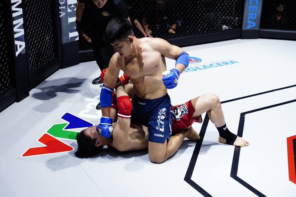 Á quân Wushu thế giới chiến thắng ấn tượng tại giải MMA Championship - 9 Á quân Wushu thế giới chiến thắng ấn tượng tại giải MMA Championship - 9