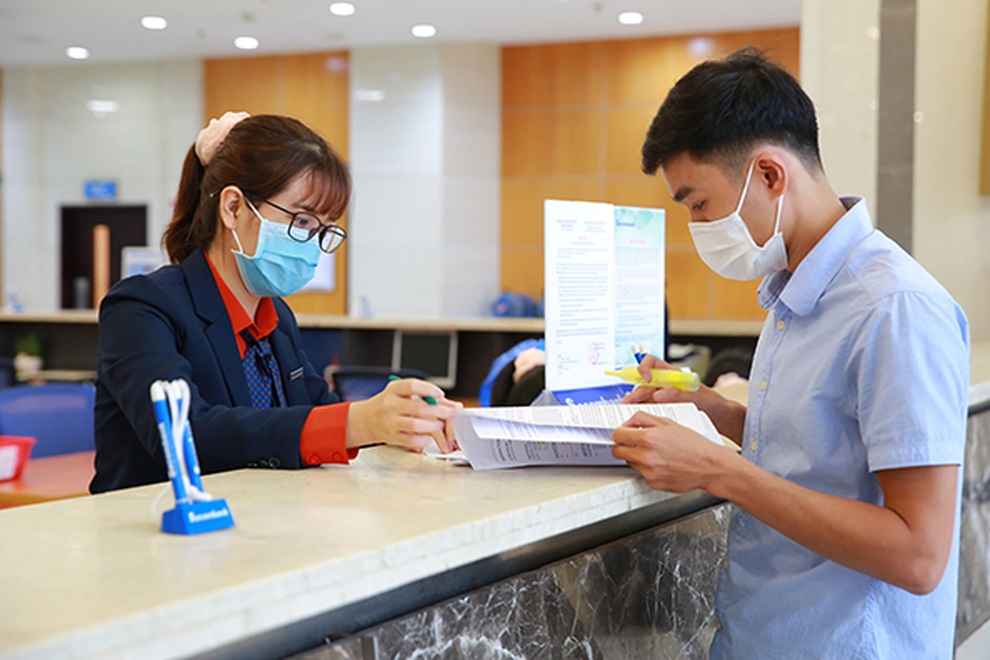 Lương nhân viên ngân hàng, công nghệ miễn nhiễm với Covid-19 - 1 Lương nhân viên ngân hàng, công nghệ miễn nhiễm với Covid-19 - 1