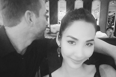 Quán quân Next Top Hoàng Thùy tình tứ cùng chàng trai giấu mặt