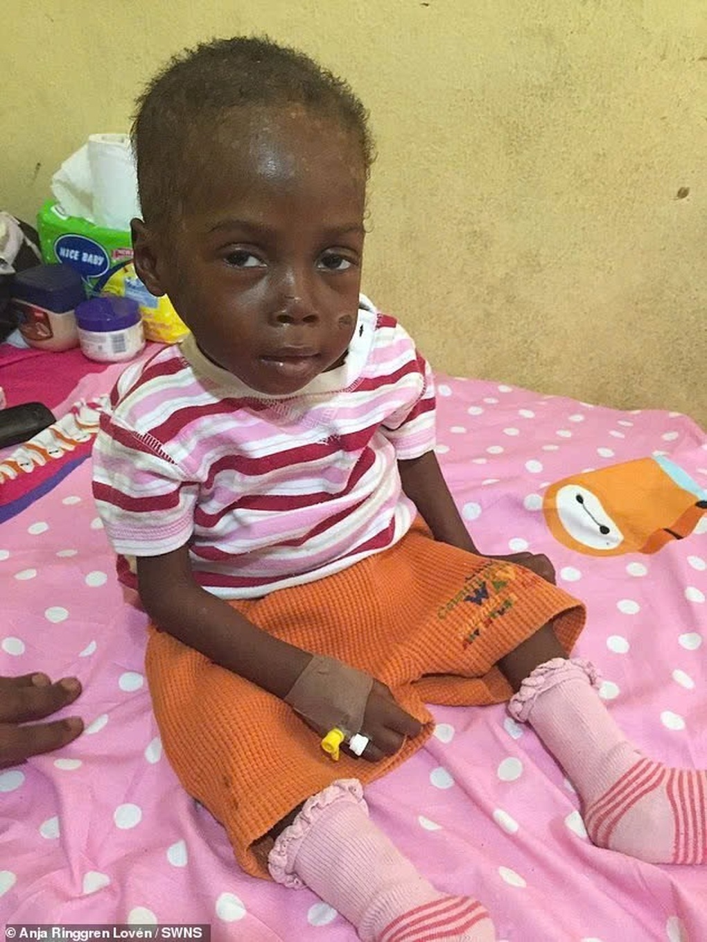 Cậu bé trong bức hình gây ám ảnh thế giới, đổi đời ngoạn mục sau 9 năm - 2 Cậu bé trong bức hình gây ám ảnh thế giới, đổi đời ngoạn mục sau 9 năm - 2