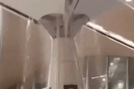 Mưa lớn khiến trần sân bay bị dột, nước tuôn xối xả như thác chảy