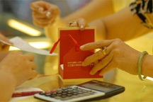 Giá vàng và USD giảm mạnh trong tuần này