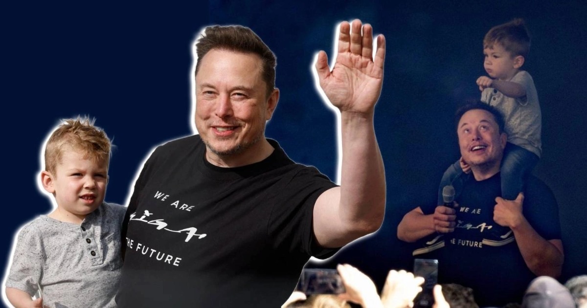 Elon Musk để con trai ngồi trên vai trong lúc đứng lên phát biểu trước các nhân viên làm việc tại nhà máy đặt ở Đức (Ảnh: Page Six).