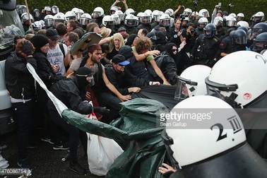 Cảnh sát Đức đụng độ với người biểu tình trước thềm khai mạc G7