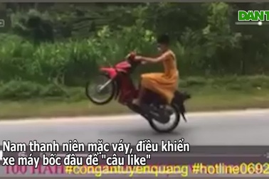 Nam thanh niên mặc váy đi xe máy bốc đầu