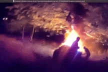 Xem cảnh sát Mỹ giải cứu tài xế khỏi chiếc xe điện bốc cháy dữ dội