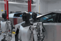Tesla tung video khoe khả năng đi lại, cầm nắm đồ vật của robot hình người