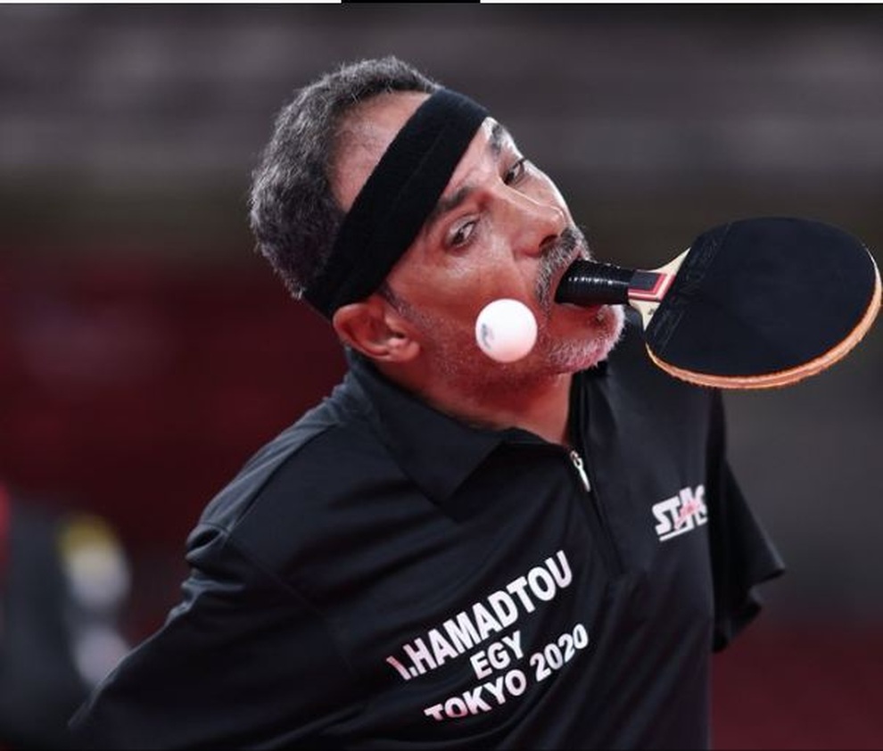 Kinh ngạc VĐV cụt hai tay, chơi bóng bàn bằng miệng ở Paralympic Tokyo - 3