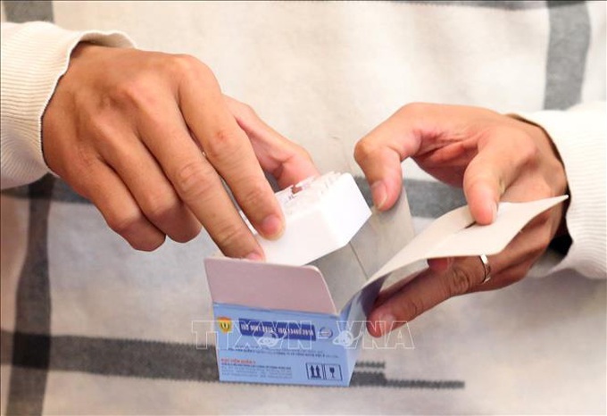 WHO chính thức khuyến cáo về sử dụng xét nghiệm chẩn đoán nhanh COVID-19 - Ảnh 1. WHO chính thức khuyến cáo về sử dụng xét nghiệm chẩn đoán nhanh COVID-19 - Ảnh 1.