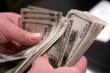 WHO cảnh báo tiền mặt có thể lây lan virus corona