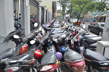 Trông giữ xe máy có phải đăng ký kinh doanh?