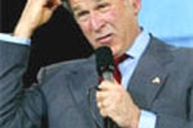 Tổng thống Bush đút gì trong túi quần?