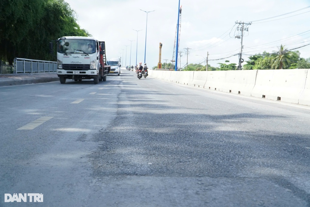 Khắc phục xong sự cố sụt lún đường dẫn cầu Tăng Long ở TPHCM - 1 Khắc phục xong sự cố sụt lún đường dẫn cầu Tăng Long ở TPHCM - 1
